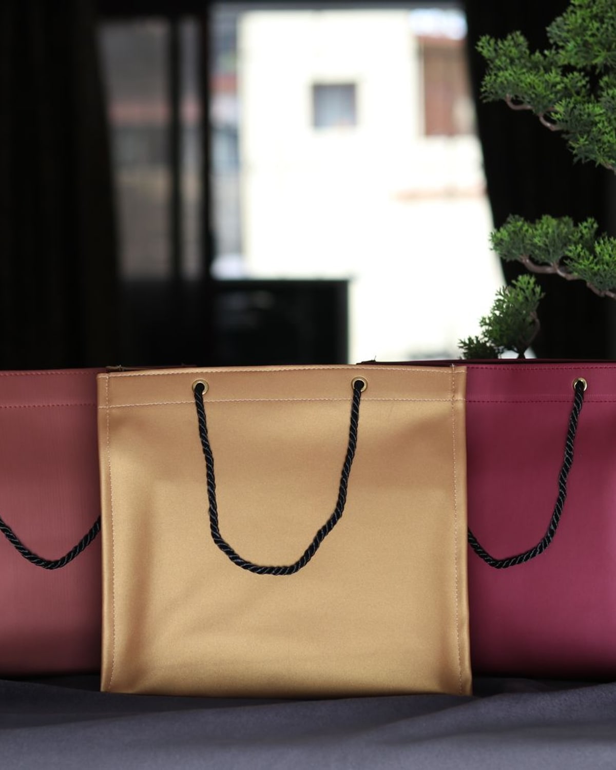 Woman carrying a large tote bag while traveling