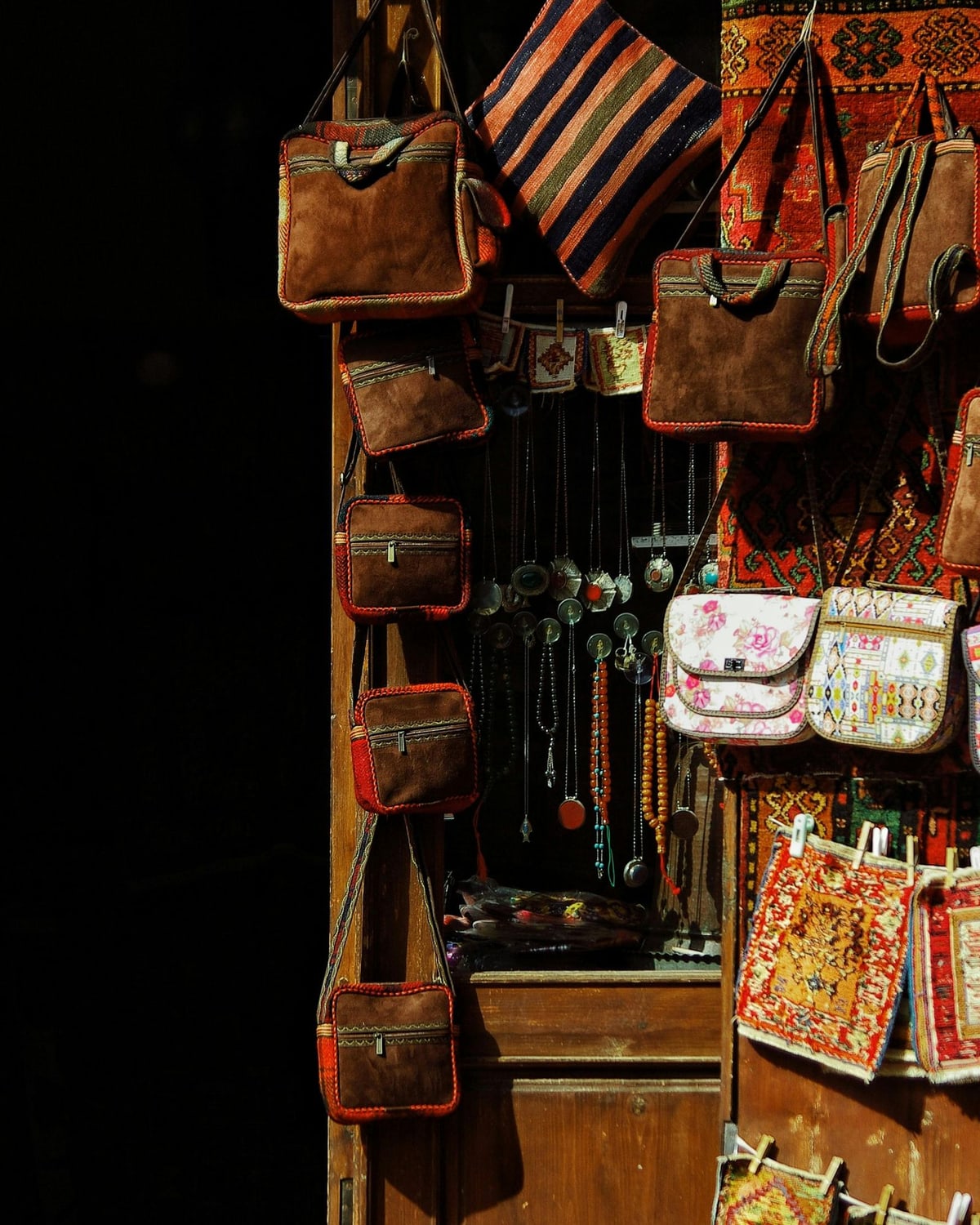 Woman adding a scarf to a seasonal outfit